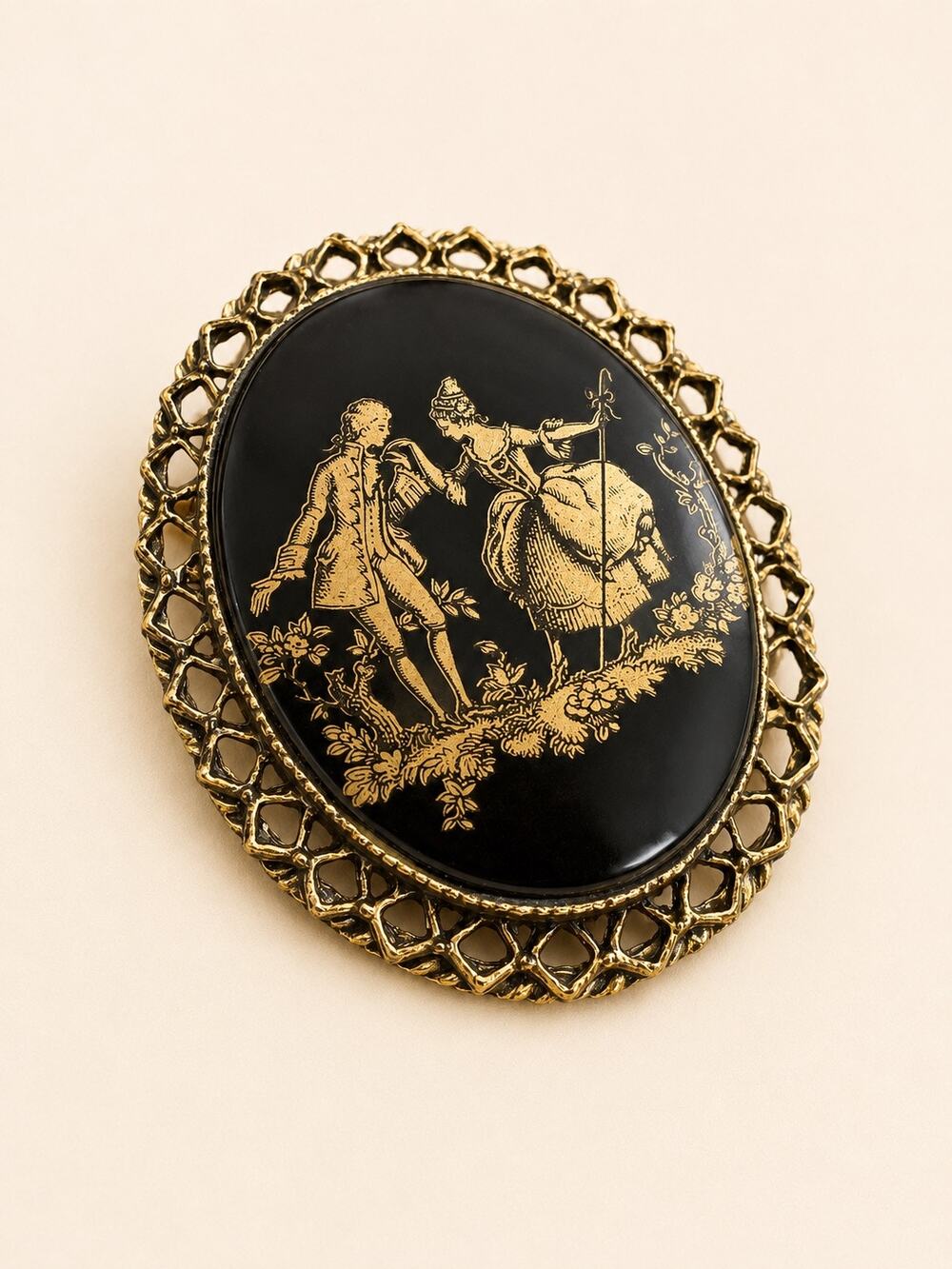Vintage Black Glass Scenic Brooch with Gold Pastoral Courting Scene